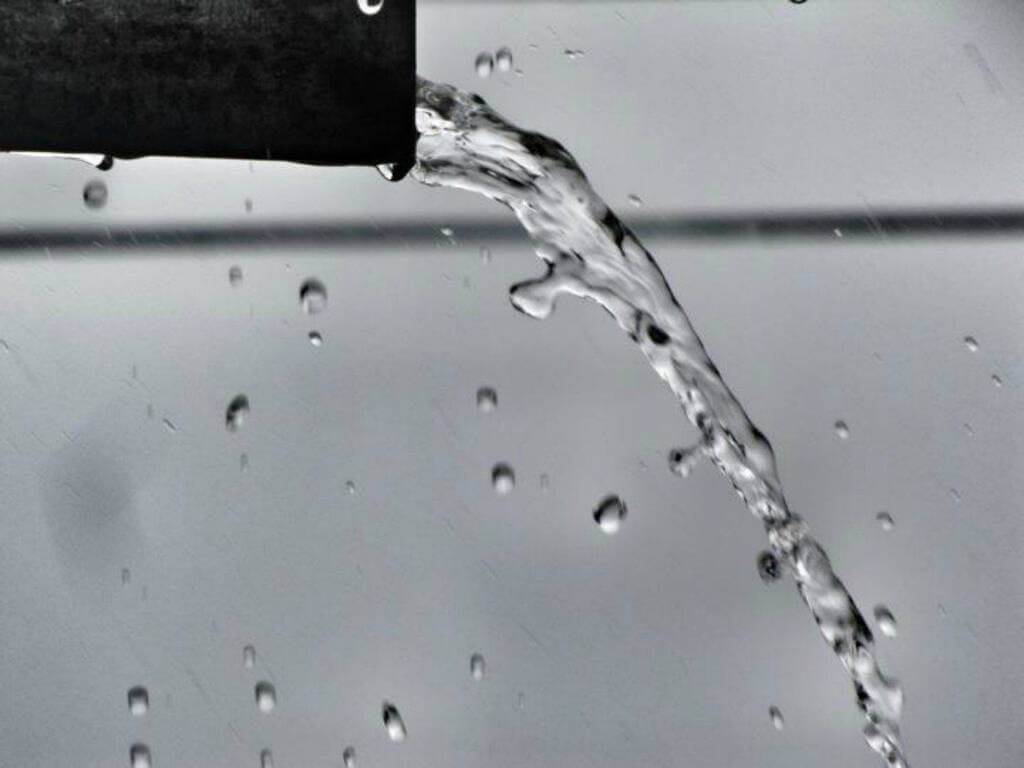 Hot water splashing out of spout