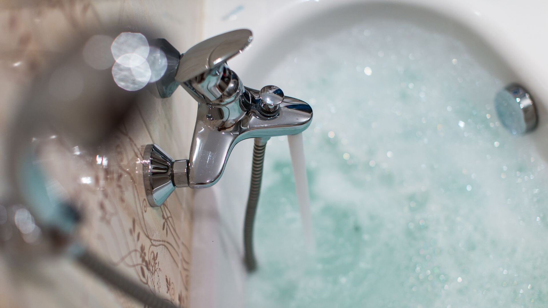running hot water into a bath
