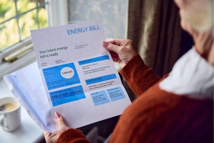 Woman looking at an energy bill
