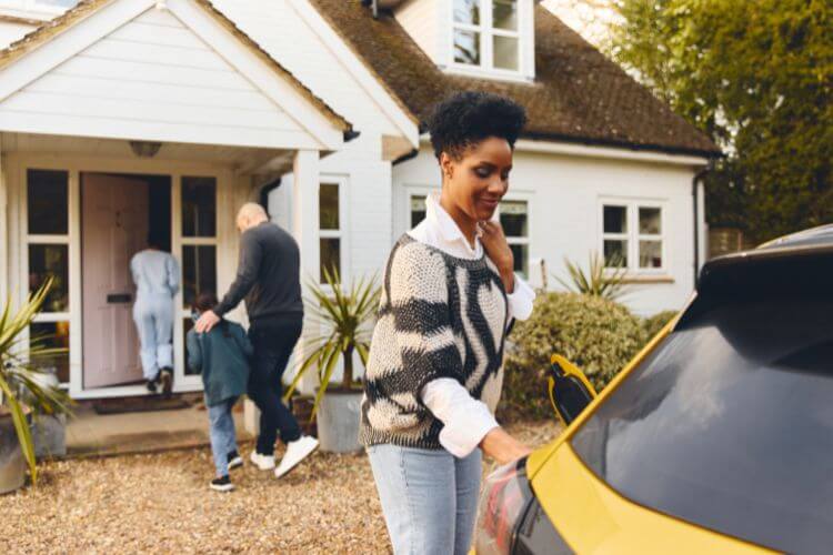 family with electric car